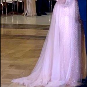 Woman’s gown with attached over skirt